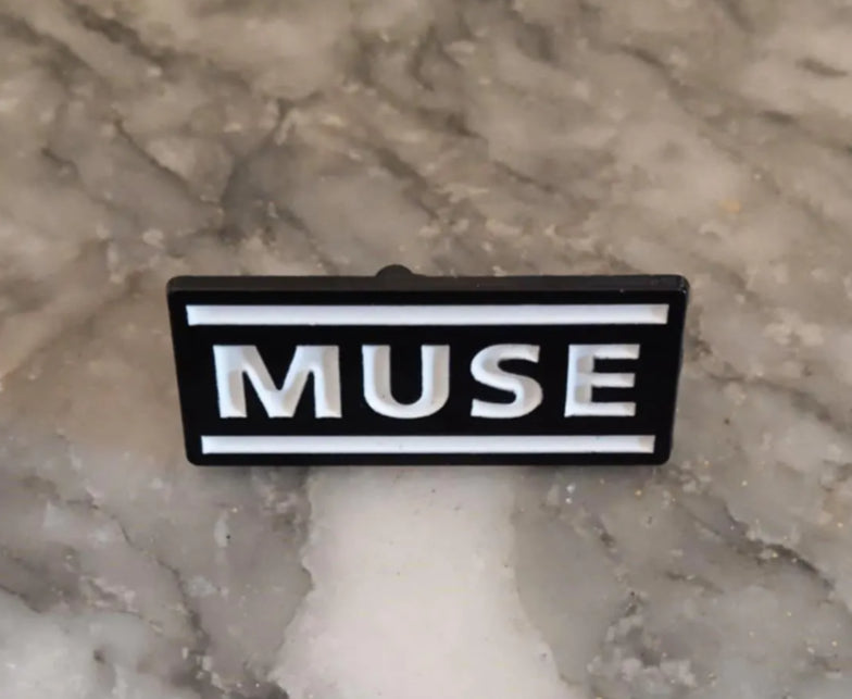 Pin's broche Muse image 0